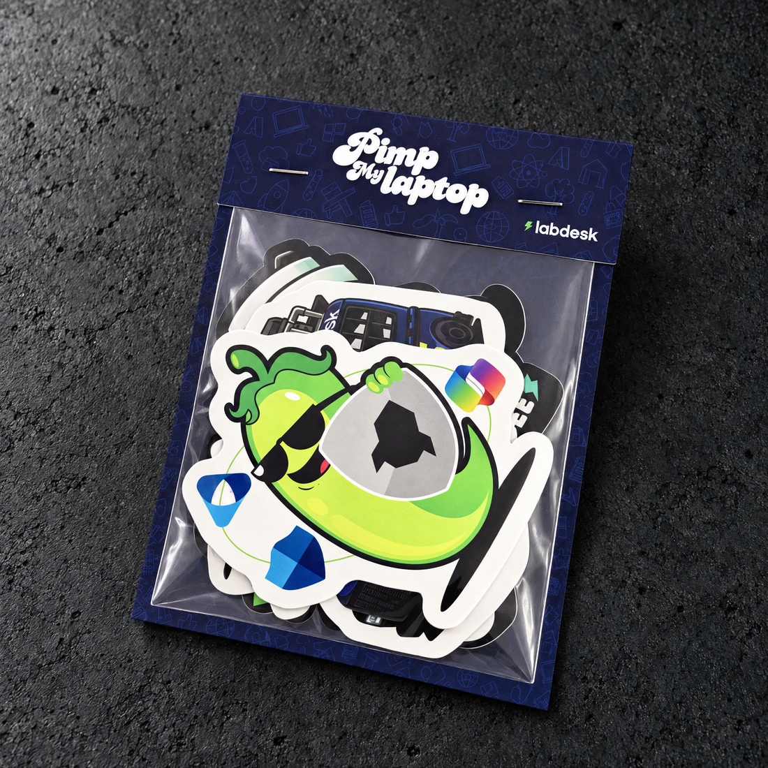 Studio front view of the Labdesk Premium sticker pack, with a navy patterned full backboard, wrap-over header and die cut stickers inside a clear sleeve.
