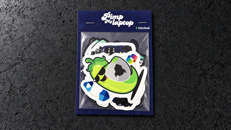 Wide studio view of a Labdesk Premium sticker pack with its full patterned backing board and wrap-over header.