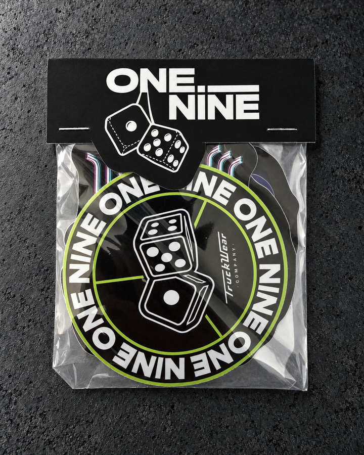 Studio view of a One Nine budget sticker pack with a custom top header card.