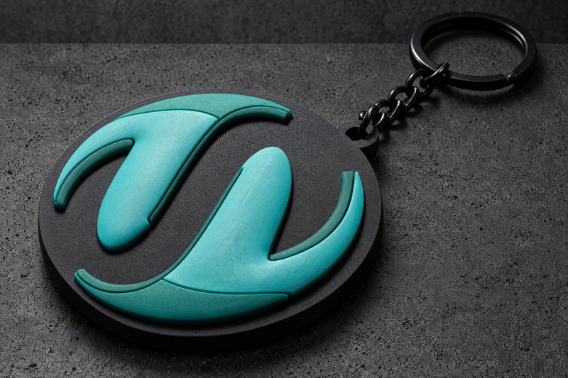 teal sculpted dome detail on a charcoal studio surface — Projectprint