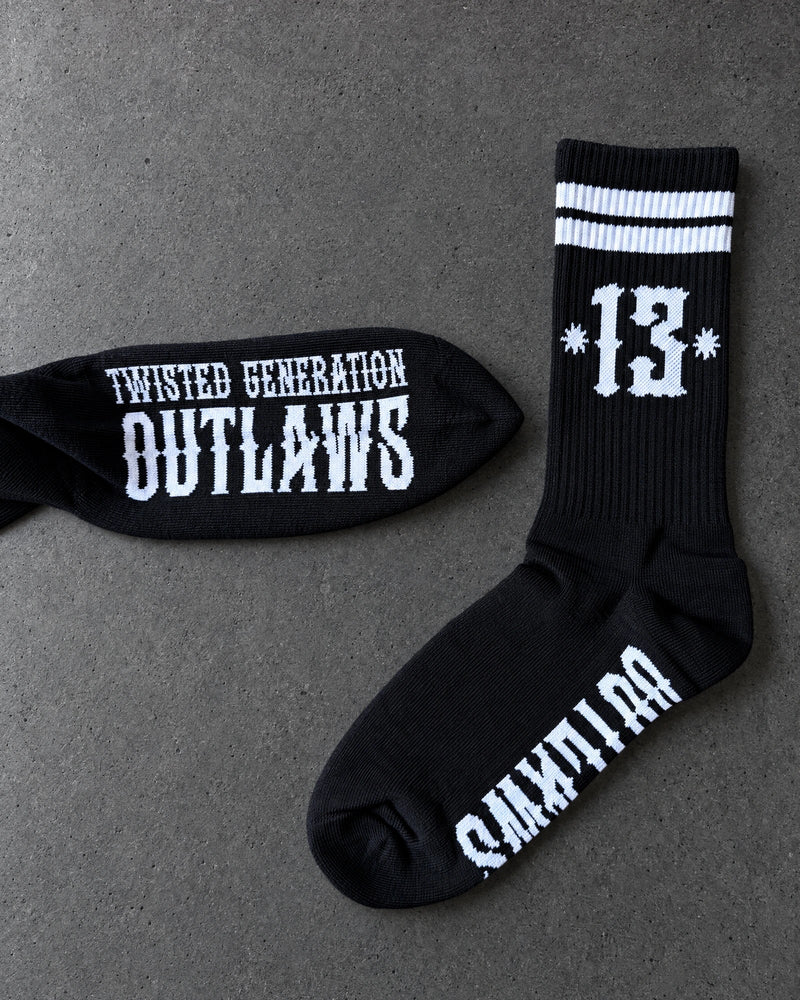 Projectprint custom jacquard knit socks — twisted generation outlaws black, studio view