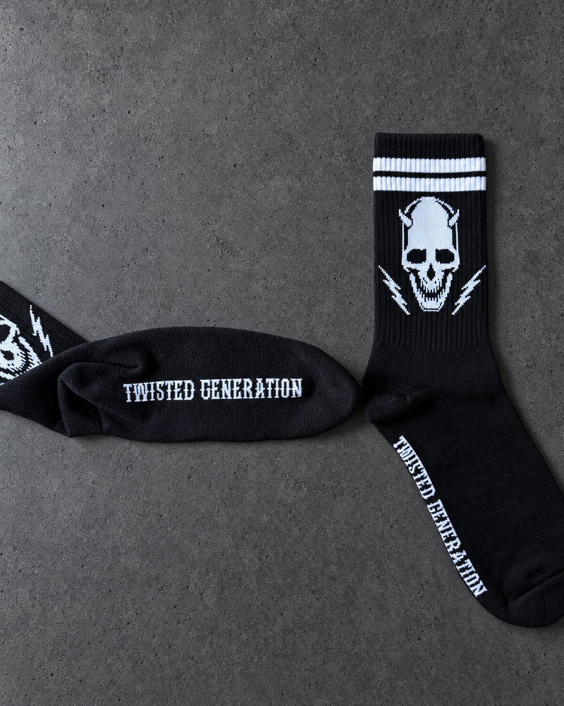 Projectprint custom jacquard knit socks — twisted generation skull black, studio view