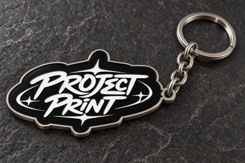 Project Print custom metal enamel keyring design in matt nickel, with matching chain and split ring.