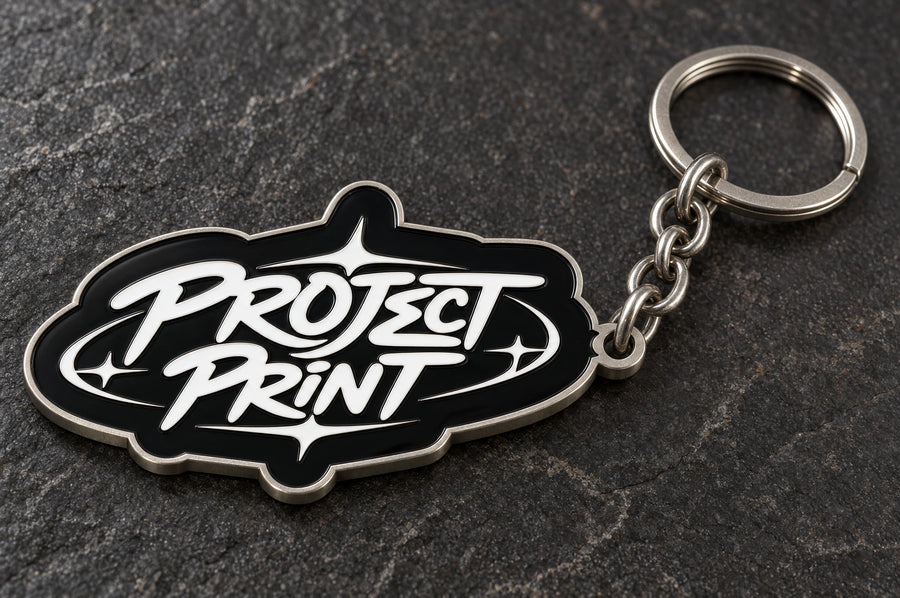 Project Print custom metal enamel keyring design in matt nickel, with matching chain and split ring.