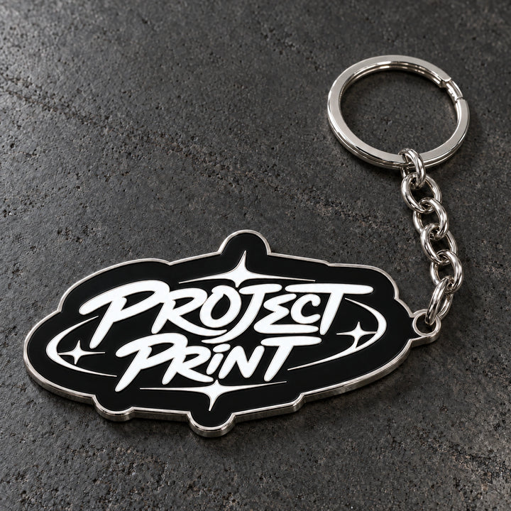 Project Print custom metal enamel keyring design in shiny silver, with matching chain and split ring.