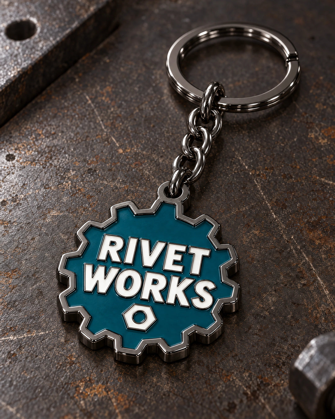 Rivet Works custom metal enamel keyring design in black nickel, with matching chain and split ring.