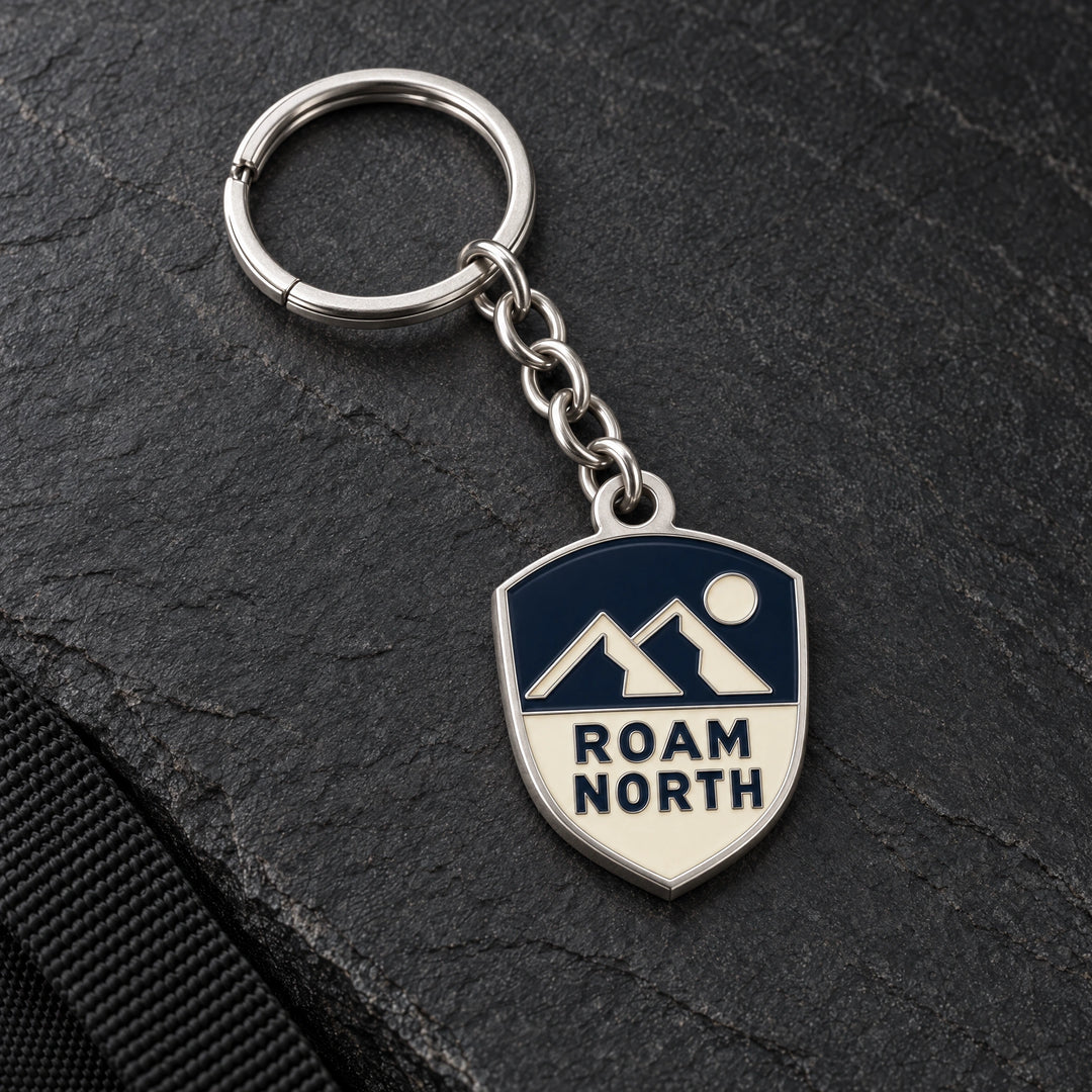 Roam North custom metal enamel keyring design in matt silver, with matching chain and split ring.
