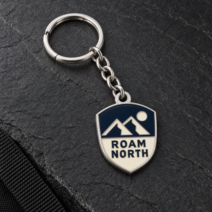 Roam North custom metal enamel keyring design in matt silver, with matching chain and split ring.