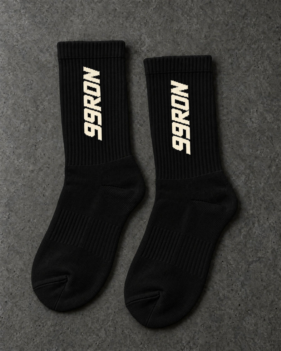 Projectprint custom terry crew socks — 99 ron black cream, upright pair studio view