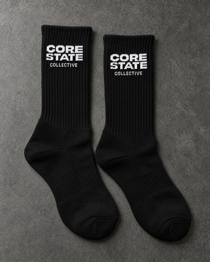 Projectprint custom terry crew socks — corestate black white, upright pair studio view