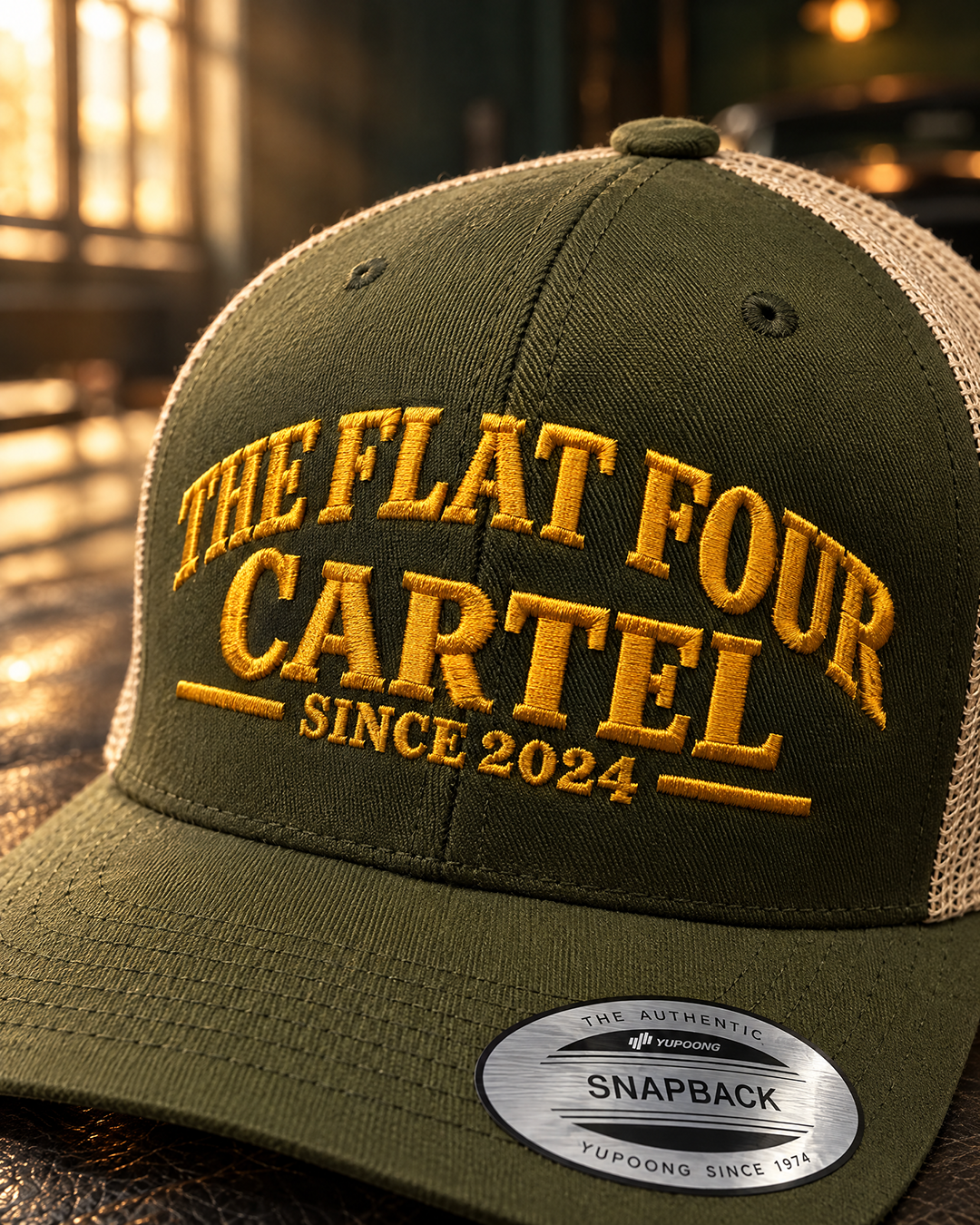 The Flat Four Cartel custom mesh trucker caps in olive/beige and black/white with gold embroidery — Project Print customer work, view 2