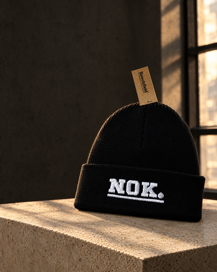 NOK. custom black ribbed cuffed beanie with white embroidered lettering — Project Print customer work, view 3