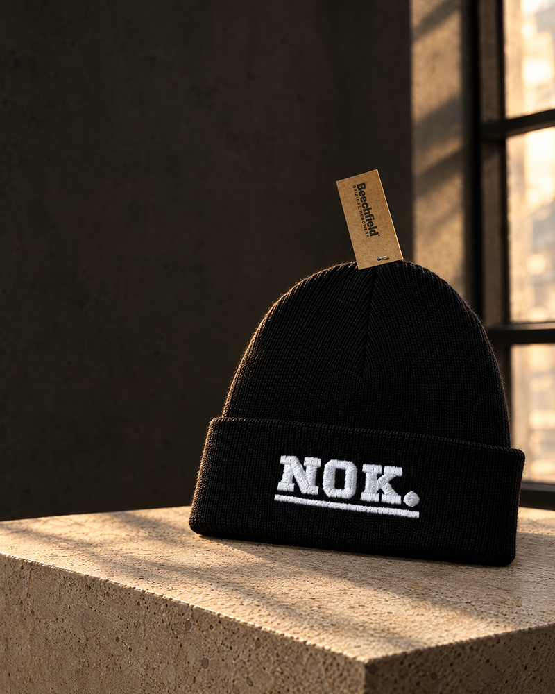 NOK. custom black ribbed cuffed beanie with white embroidered lettering — Project Print customer work, view 3