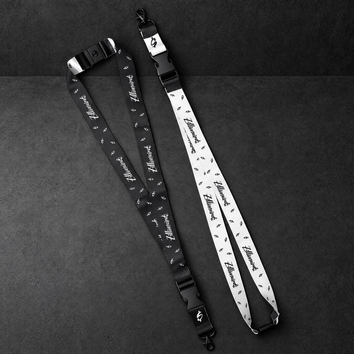 zillionaire printed lanyard pair on a charcoal studio surface — Projectprint