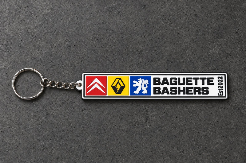 Projectprint custom soft PVC keyring — baguette bashers, charcoal studio product photograph
