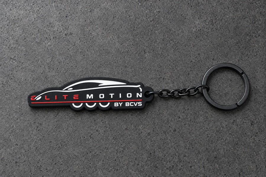 Projectprint custom soft PVC keyring — elite motion, charcoal studio product photograph