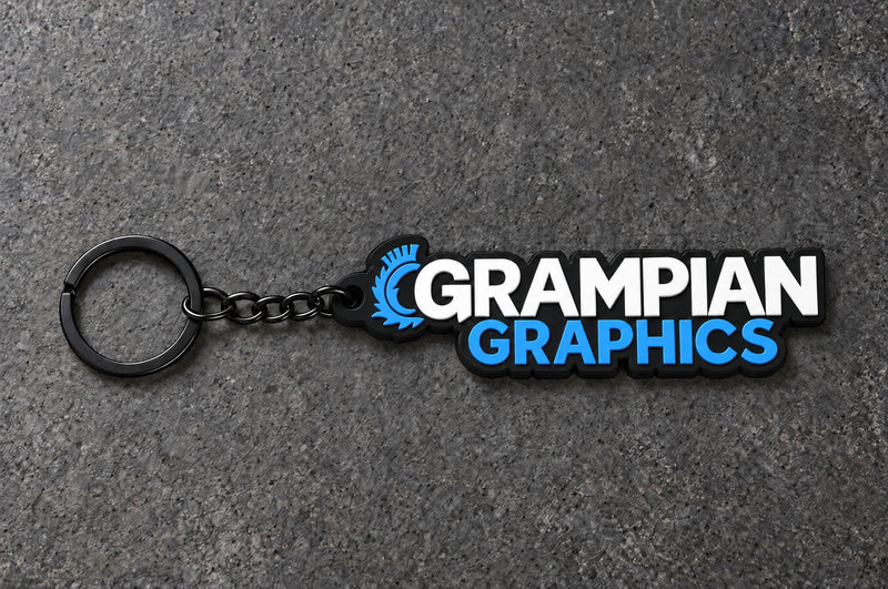 Projectprint custom soft PVC keyring — grampian graphics, charcoal studio product photograph
