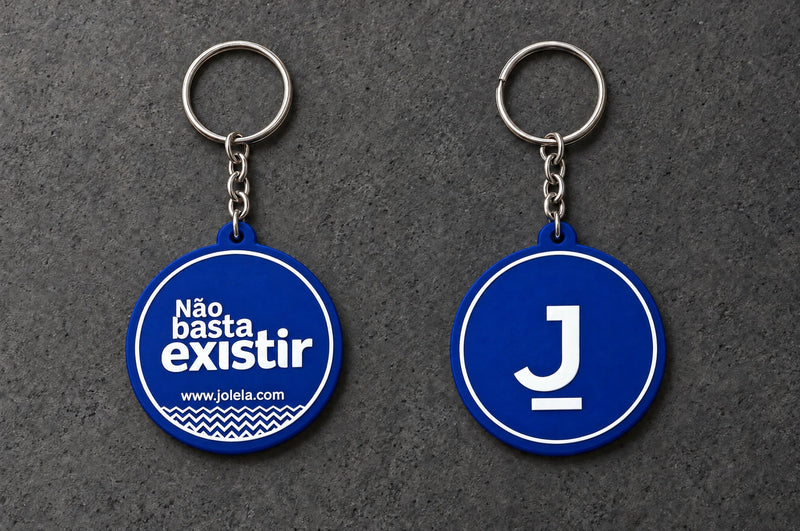 Projectprint custom soft PVC keyring — jolela front back, charcoal studio product photograph