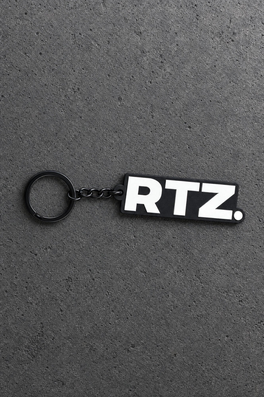 Projectprint custom soft PVC keyring — rtz, charcoal studio product photograph