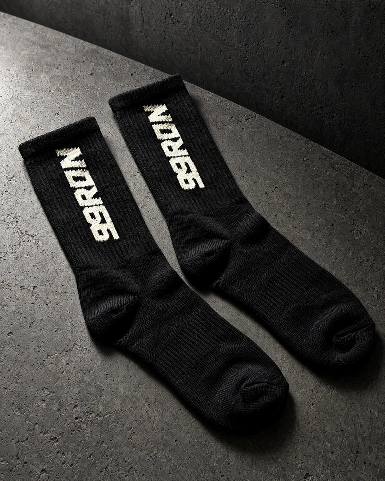 terry socks on a charcoal studio surface — Projectprint