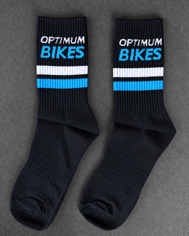 Projectprint custom jacquard knit socks — optimum bikes black blue, studio view