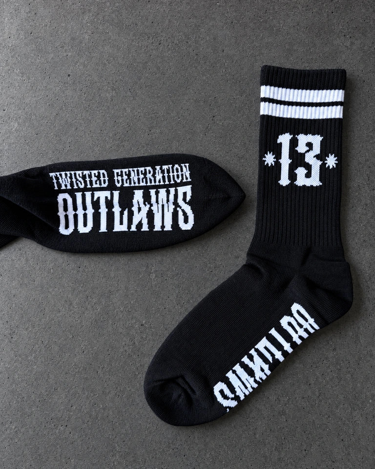 Projectprint custom jacquard knit socks — twisted generation outlaws black, studio view