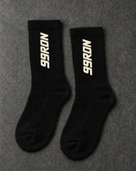 Projectprint custom terry crew socks — 99 ron black cream, upright pair studio view
