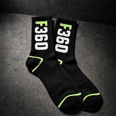 jacquard knit socks on a charcoal studio surface — Projectprint