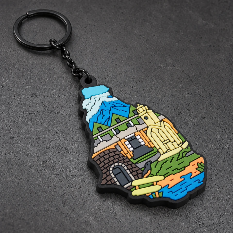 custom soft pvc keyrings on a charcoal studio surface — Projectprint