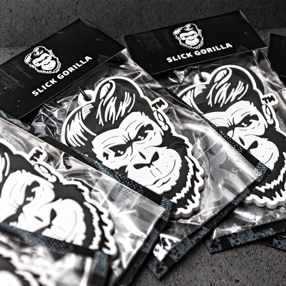 custom soft pvc keyrings on a charcoal studio surface — Projectprint