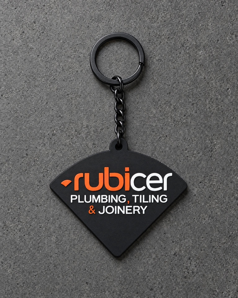 Projectprint custom soft PVC keyring — rubicer, charcoal studio product photograph